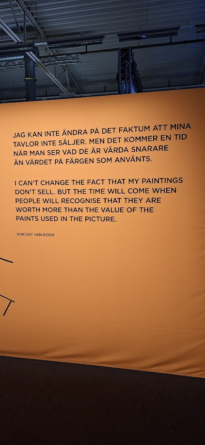 A wall with a quote from Vincent van Gogh: "I can't change the fact that my
photos don't sell. But the time will come when people will recognize that
they are worth more than the value of the paints used in the
picture"